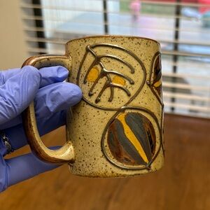 Artisan Ceramic Mug with Earthy Design